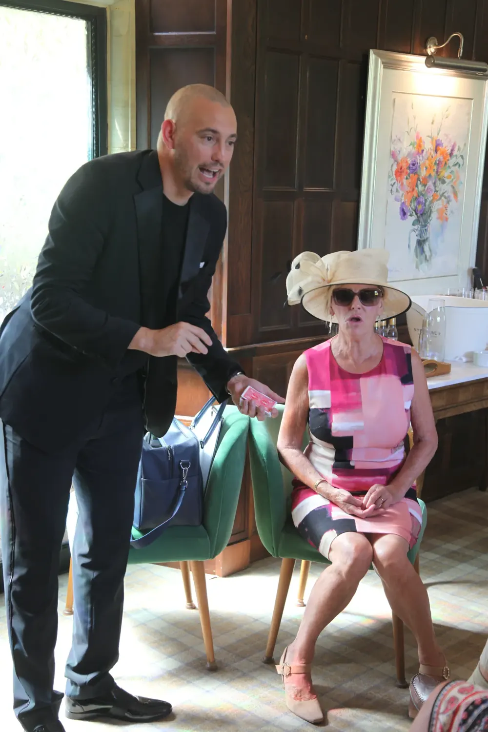 A guest volunteer joining Matt Parrou2019s after-dinner show