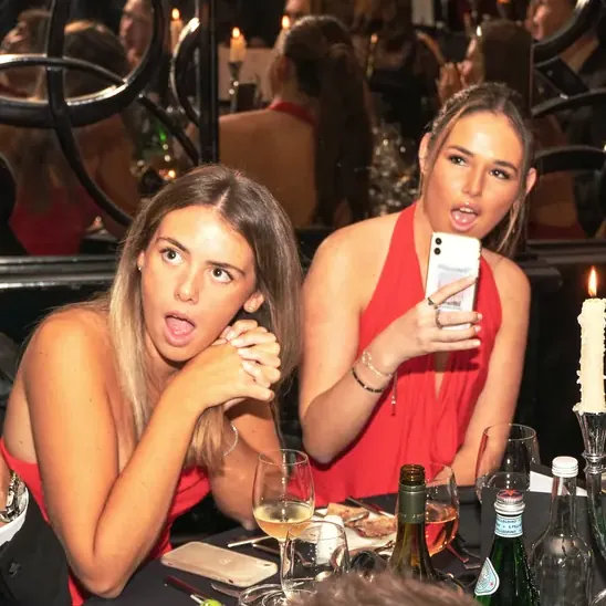Gala dinner guests reacting to Matt Parrou2019s magic