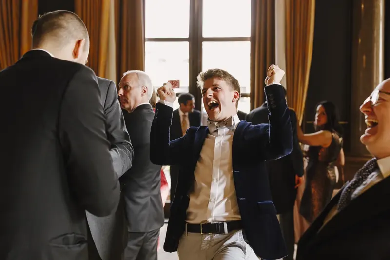 A guest jumping with excitement