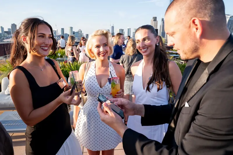 Guests amazed on a rooftop