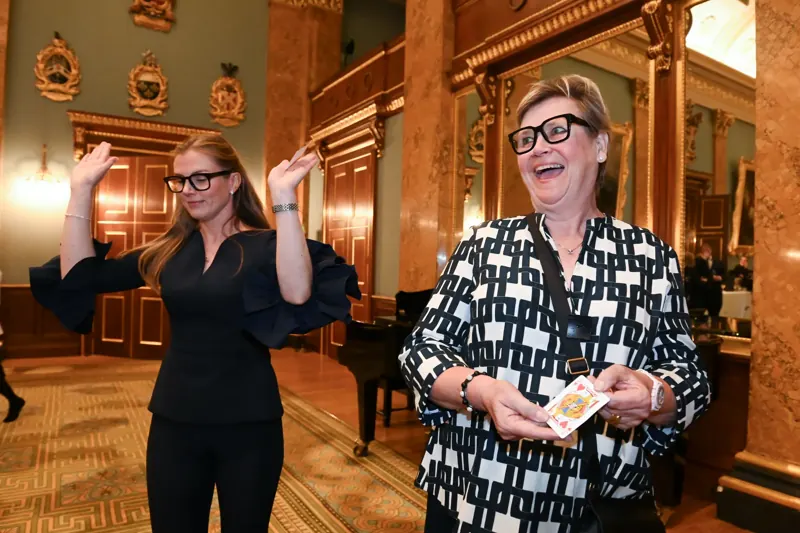 Guests celebrating a magic trick