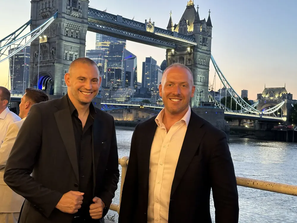 Matt Parro and a fellow magician at a London event by Tower Bridge