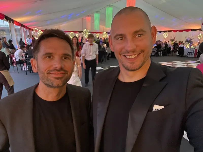 Matt Parro and a fellow magician at a marquee evening event