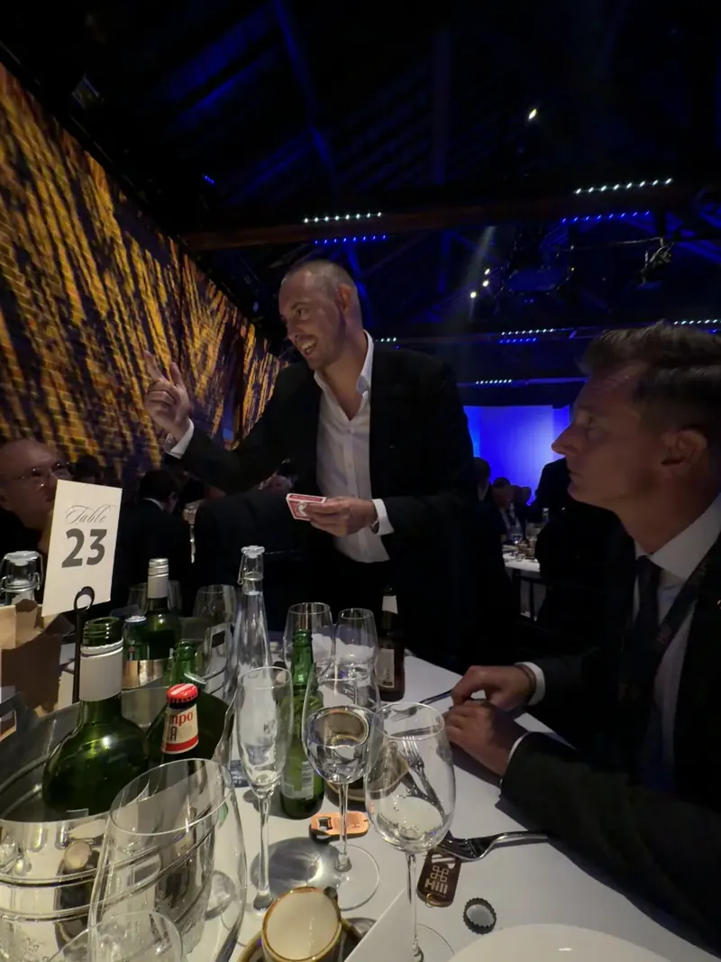 Matt Parro performing at a corporate gala dinner table
