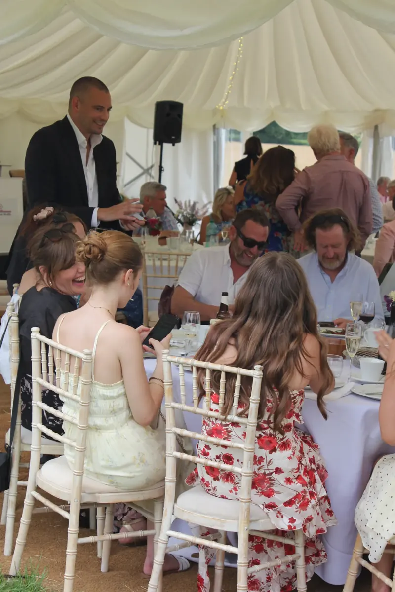 Matt Parro performing at a marquee garden party