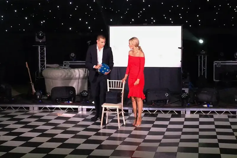 Matt Parro with a volunteer during a mind-reading show