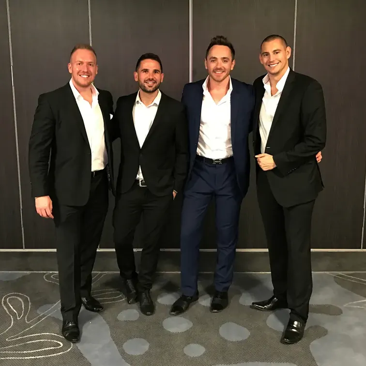 Matt Parro with his team of magicians in black tie