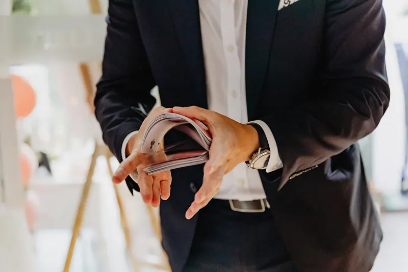 Matt Parrou2019s hands performing a card flourish