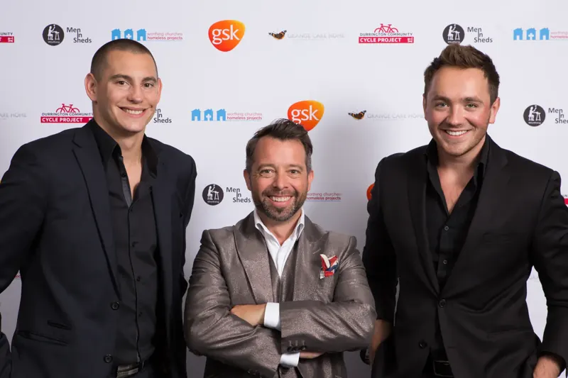 Three magicians at a corporate awards event