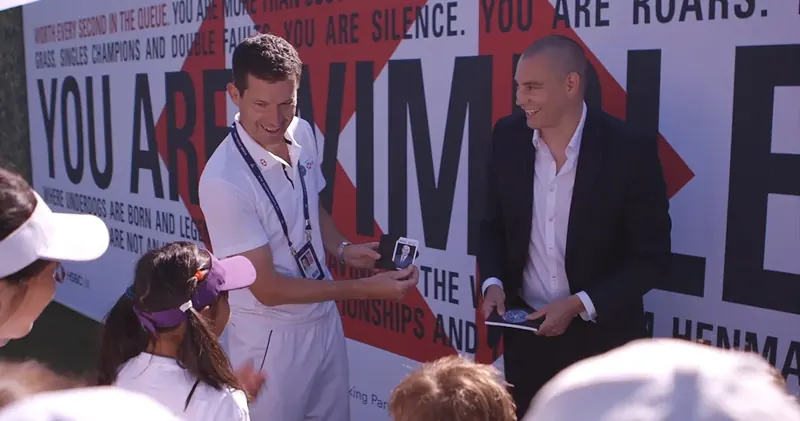 Tim Henman with magician Matt Parro at Wimbledon