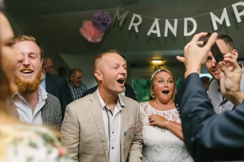 Wedding guests shocked at an evening reception